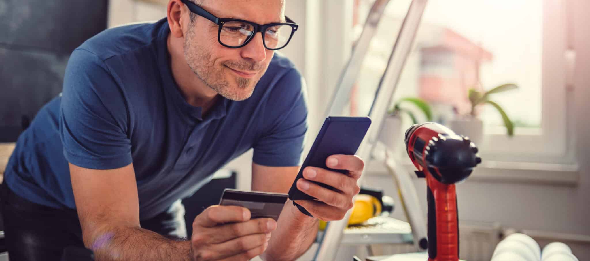 Nashville man using digital banking tools to track his online spending while renovating his household.